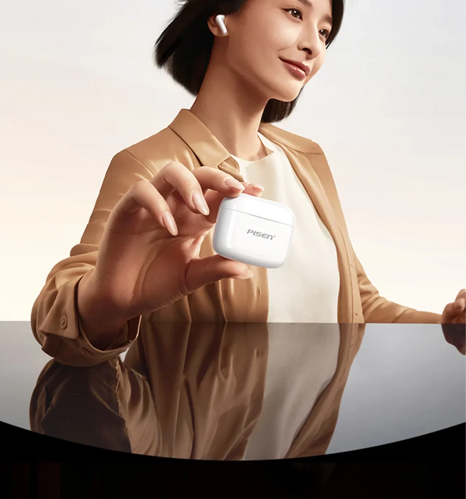 PISEN P1 Plus wireless earbuds - charging case held in a hand
